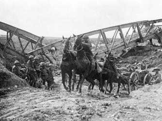 British 18 pounder gun team moves up during the Battle of the Canal du Nord, September 27, 1918 (IWM)